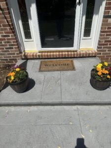 Hardscaping and Landscaping work with a brick-style finish